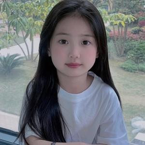 李 小增
